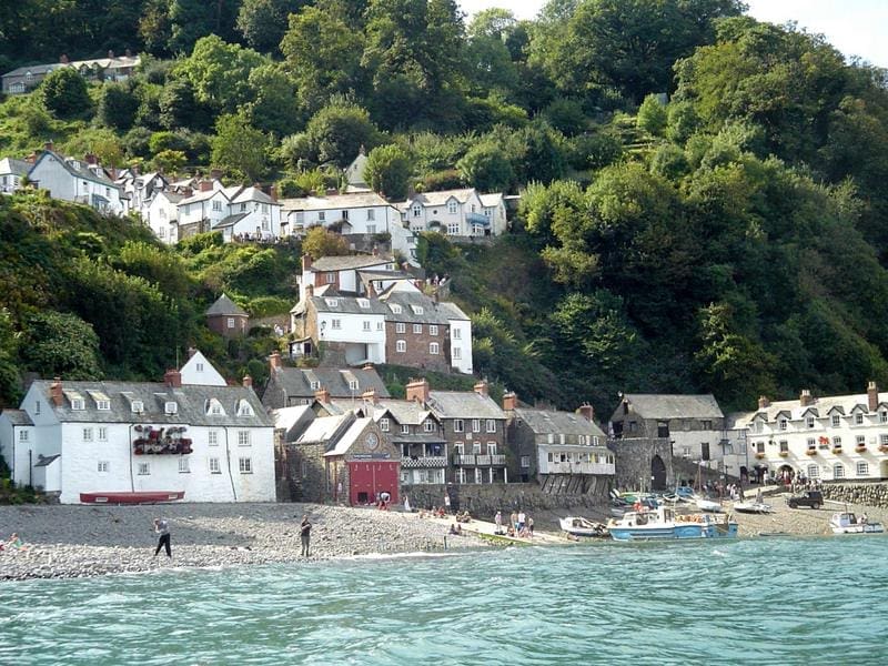 Clovelly village viewed from the sea and one of the top places to visit in North Devon